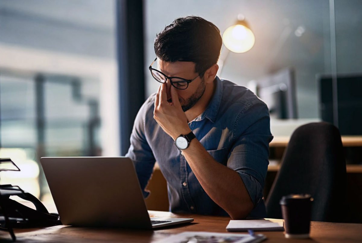 a man suffering from Digital Eye Strain